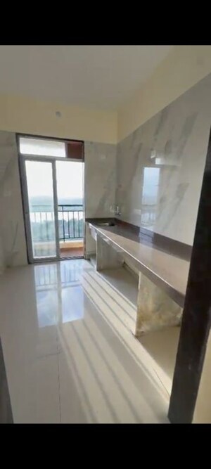 Kitchen in 2 BHK Apartment at Swaminarayan City, Dombivli West – for Rent