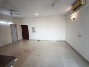 Living Room in 2 BHK Apartment at Emaar The Palm Drive-Palm Studios, Sector 66 – for Rent