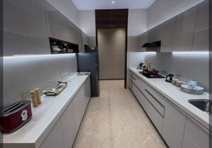 Kitchen in 2.5 BHK Apartment at T Bhimjyani Neelkanth Woods, Manpada – for Rent