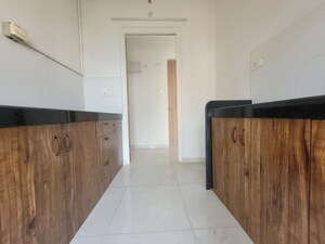 Kitchen in 1.5 BHK Apartment at Godrej Emerald, Ghodbunder Road – for Rent