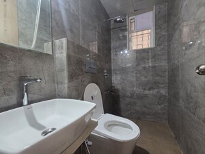 Bathroom in 3 BHK Apartment at Dosti West County, Balkum Pada – for Rent