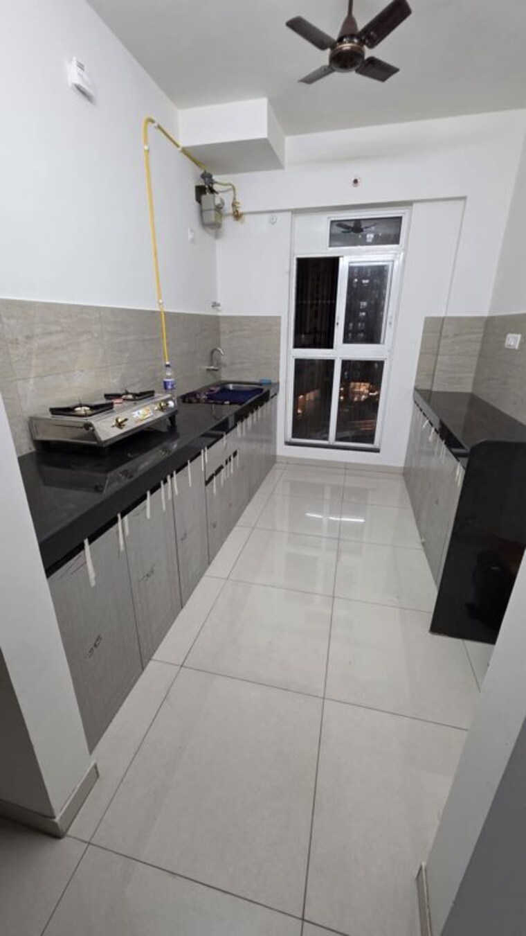 Kitchen, godrej-emerald 2 Bedroom 927 Sq.Ft. Apartment In Ghodbunder Road Thane 10633902