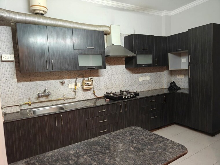 Kitchen, defence colony 3 Bedroom 217 Sq.Yd. Builder Floor In Defence Colony Delhi 10728906