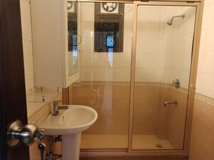 Bathroom in 3 BHK Builder Floor at Defence Colony – for Rent