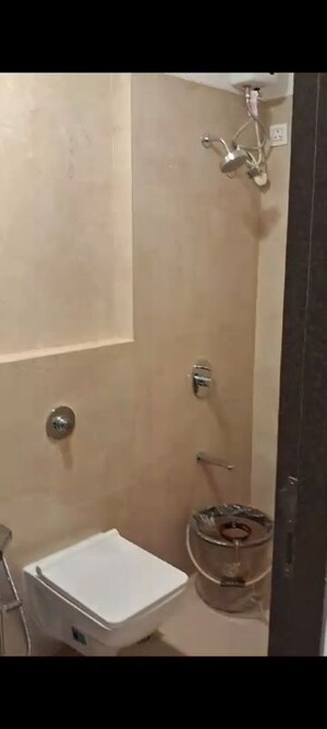 Bathroom in 2 BHK Apartment at Shree Sai D N Nagar Dwarka CHS, Andheri West – for Rent