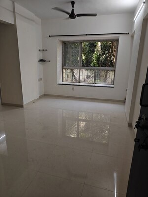 Room in 2 BHK Apartment at Coronet Building, Kandivali East – for Rent