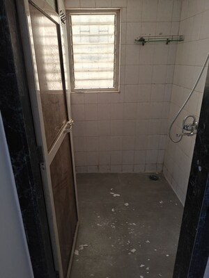 Bathroom in 2 BHK Apartment at Coronet Building, Kandivali East – for Rent