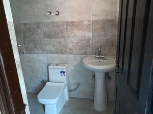 Bathroom in 2.5 BHK Apartment at Bluemoon Central, Raj Nagar Extension – for Sale