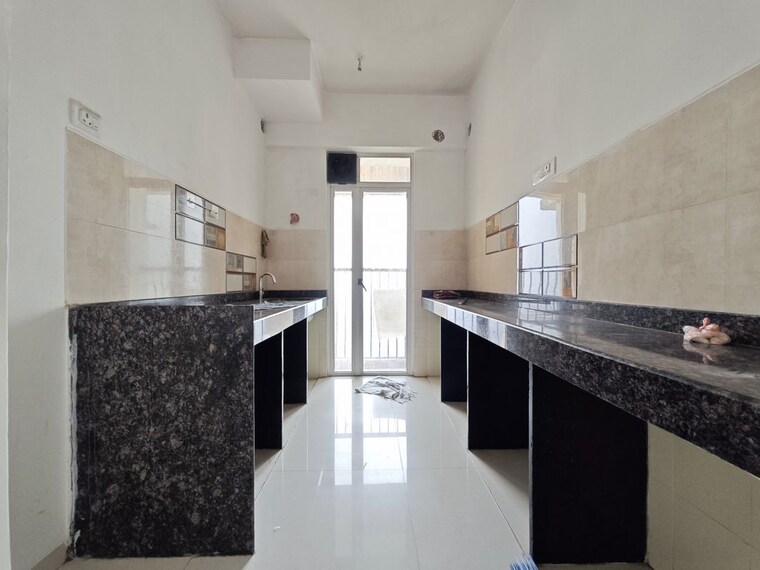 Kitchen, marathon-nexzone-nirvana 2 Bedroom 656 Sq.Ft. Apartment In Palaspe Phata Navi Mumbai 10729058
