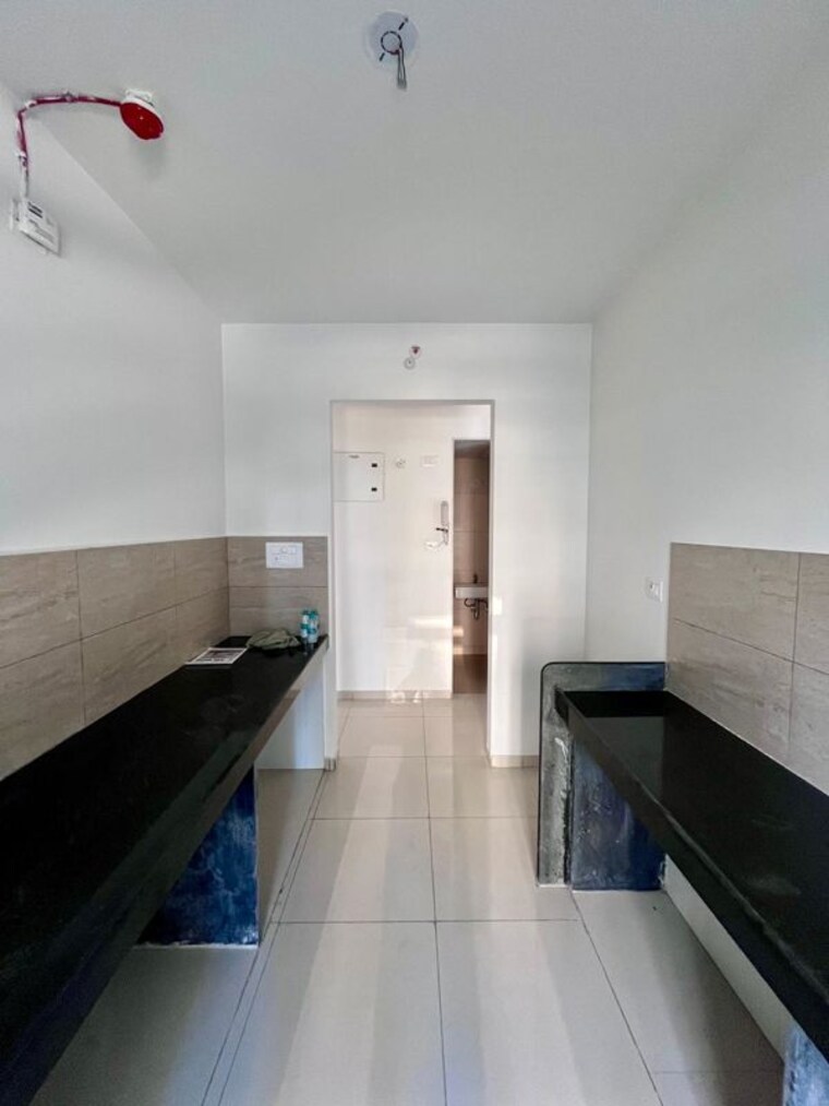 Kitchen, godrej-emerald 2 Bedroom 1000 Sq.Ft. Apartment In Ghodbunder Road Thane 10729070