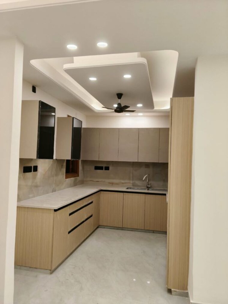Kitchen, freedom fighters enclave 4 Bedroom 2000 Sq.Ft. Apartment In Freedom Fighters Enclave Delhi 10729111