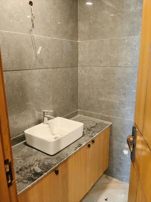 Bathroom in 4 BHK Apartment at Freedom Fighters Enclave – for Rent