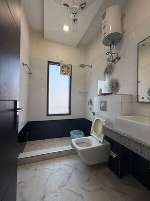 Bathroom in 4 BHK Builder Floor at Sector 56 – for Rent