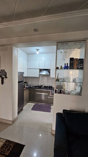 Kitchen in 2 BHK Apartment at Amrapali Enchante, Tech Zone 4 Greater Noida – for Rent