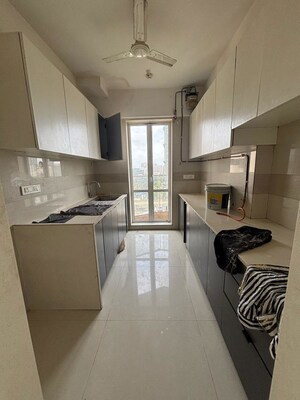 Kitchen in 1 BHK Apartment at Puranik City Phase III, Ghodbunder Road – for Sale
