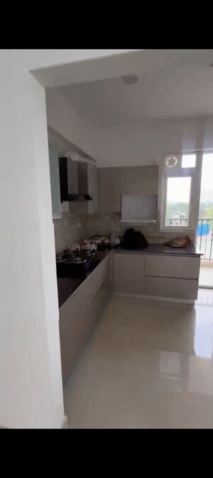 Kitchen in 3 BHK Apartment at ATS Picturesque Reprieves, Sector 152 – for Rent