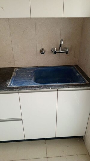Kitchen in 3 BHK Apartment at Samridhi Luxuriya Avenue, Sector 150 – for Rent