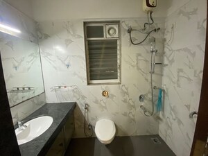 Bathroom in 2 BHK Apartment at Vasudha Etasha, Kothrud – for Rent