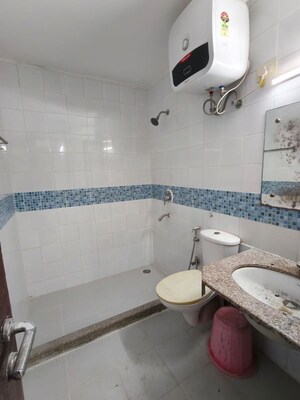 Bathroom in 3 BHK Apartment at Unitech Uniworld Gardens 2, Sector 47 – for Rent