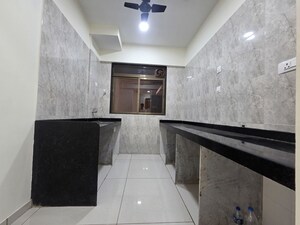Kitchen in 2 BHK Apartment at Chandak 34 Park Estate, Goregaon West – for Rent