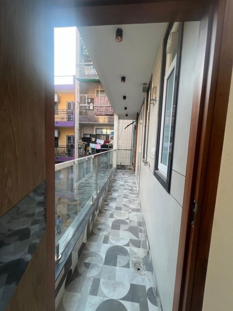 Balcony, dwarka 3 Bedroom 130 Sq.Yd. Builder Floor In Dwarka Delhi 10729400