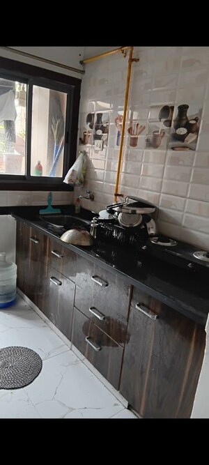 Kitchen in 2 BHK Apartment at Shiv Green, Ghuma – for Rent
