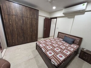 Bedroom in 2 BHK Apartment at Titanium Towers, Andheri West – for Rent