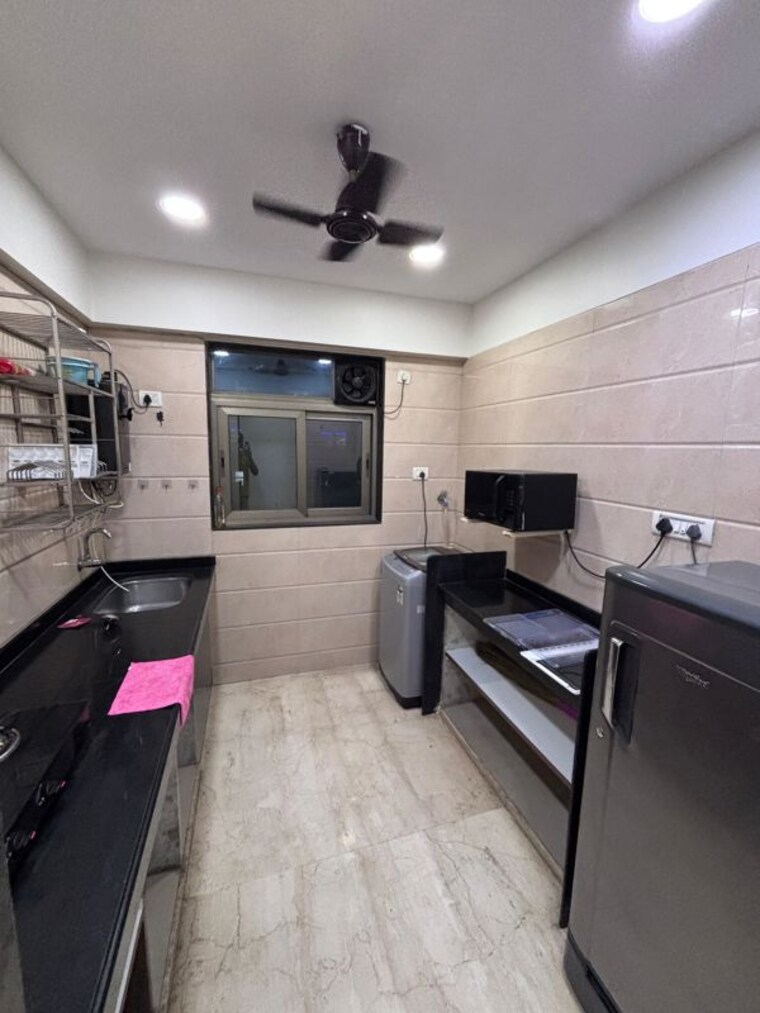 Kitchen, titanium-towers 2 Bedroom 670 Sq.Ft. Apartment In Andheri West Mumbai 10729486