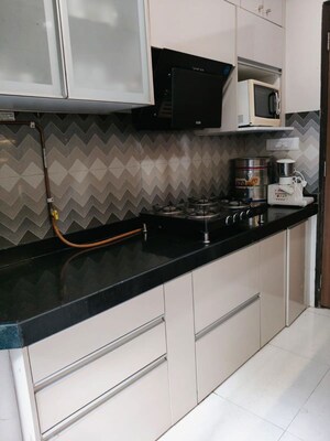 Kitchen in 2 BHK Apartment at Lodha Splendora River View, Ghodbunder Road – for Rent