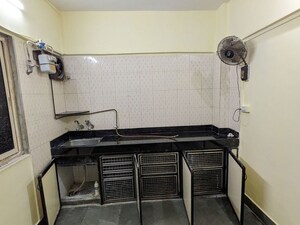 Kitchen in 2 BHK Apartment at Shri Bimla Apartment, Andheri East – for Sale