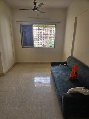 Living Room in 1 BHK Apartment at Lokmanya CHS, Tilak Nagar – for Rent