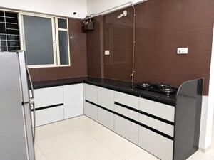 Kitchen in 3 BHK Apartment at Sukhwani Elmwoods, Pimple Saudagar – for Rent