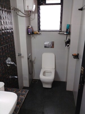 Bathroom in 2 BHK Apartment at Rutu Estate, Brahmand – for Sale