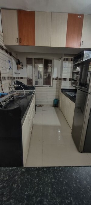 Kitchen in 2 BHK Apartment at GK Rose Icon, Pimple Saudagar – for Sale