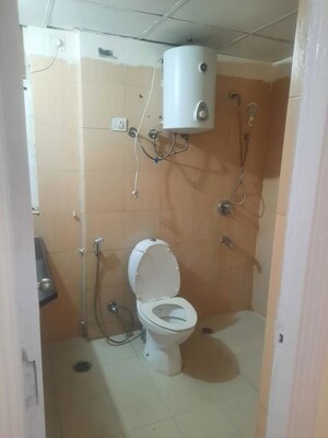 Bathroom in 4 BHK Apartment at Orchid Petals, Sector 49 – for Sale