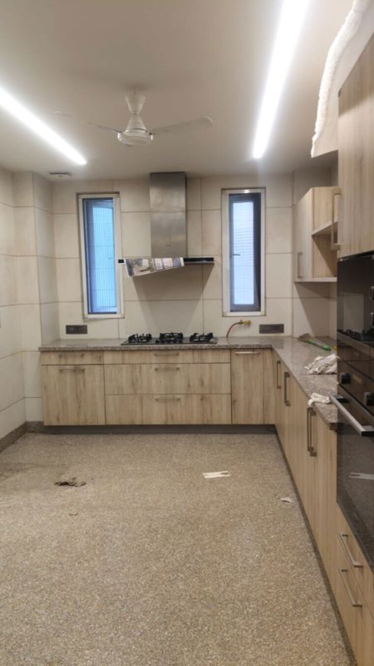 Kitchen, chirag enclave 4 Bedroom 500 Sq.Yd. Builder Floor In Chirag Enclave Delhi 10729829
