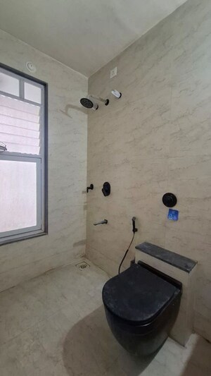 Bathroom in 3 BHK Apartment at Unique K Town, Kiwale – for Rent