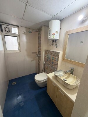 Bathroom in 3 BHK Apartment at Aims Golf City, Sector 75 – for Rent