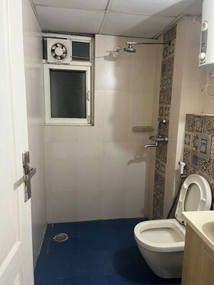 Bathroom in 3 BHK Apartment at Aims Golf City, Sector 75 – for Rent