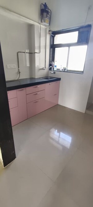 Kitchen in 1 BHK Apartment at Raunak Unnathi Woods Phase 7 A And B, Ghodbunder Road – for Rent