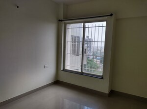 Room in 2 BHK Apartment at Mittal Arcvista, Dhanori – for Rent
