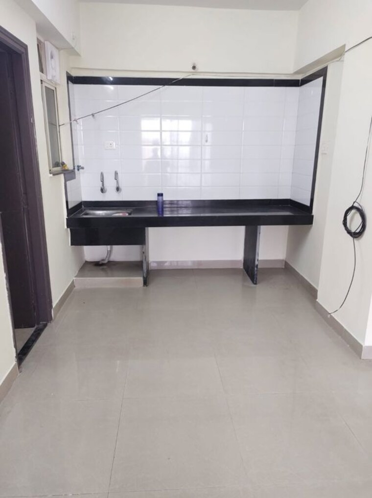 Kitchen, mittal-arcvista 2 Bedroom 1000 Sq.Ft. Apartment In Dhanori Pune 10730165