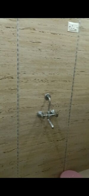 Bathroom in 3 BHK Builder Floor at Vasundhara Sector 13 – for Sale