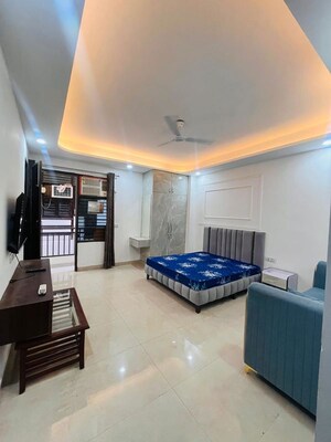 Bedroom in 4 BHK Builder Floor at Sushant Lok I – for Rent