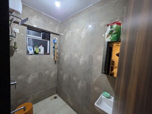 Bathroom in 1 BHK Apartment at Mauli Pride, Malad East – for Rent