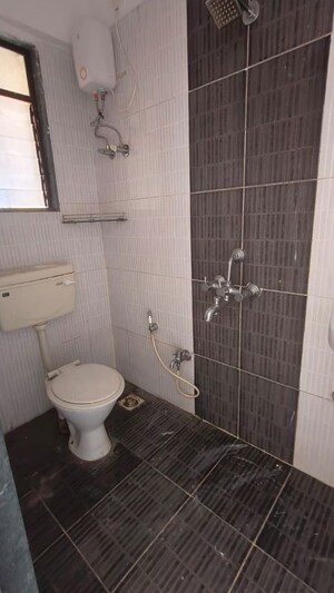 Bathroom in 2 BHK Apartment at Kamdhenu Pride, Kharghar – for Rent