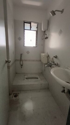 Bathroom in 2 BHK Apartment at Kamdhenu Pride, Kharghar – for Rent