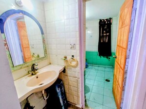Bathroom in 3 BHK Apartment at Sector 19 Dwarka – for Rent