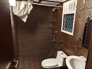 Bathroom in 4 BHK Apartment at Embassy Habitat, Palace Road – for Rent