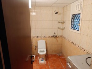 Bathroom in 4 BHK Apartment at Embassy Habitat, Palace Road – for Rent